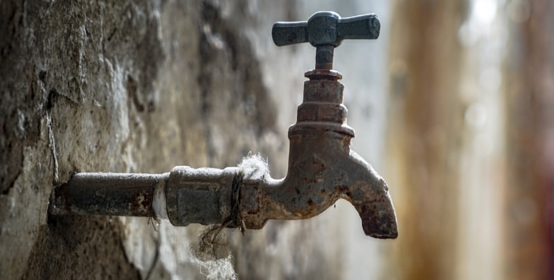 Bacteria can build up when plumbing is not used.